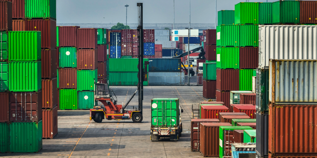 Shipping containers stacked upon each other.